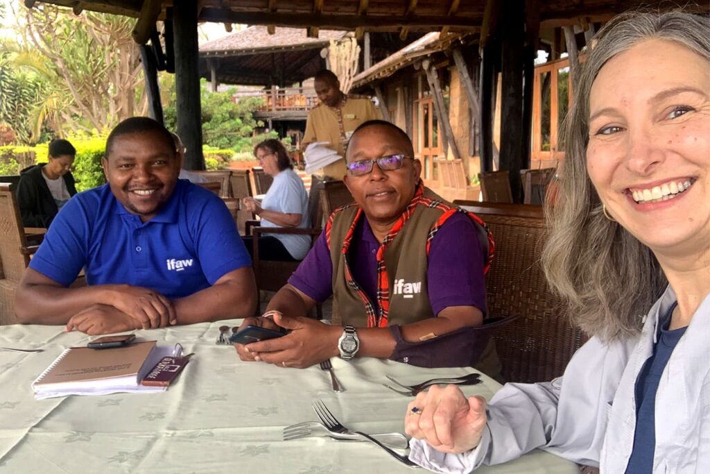 Beth Allgood selfie with two people from IFAW